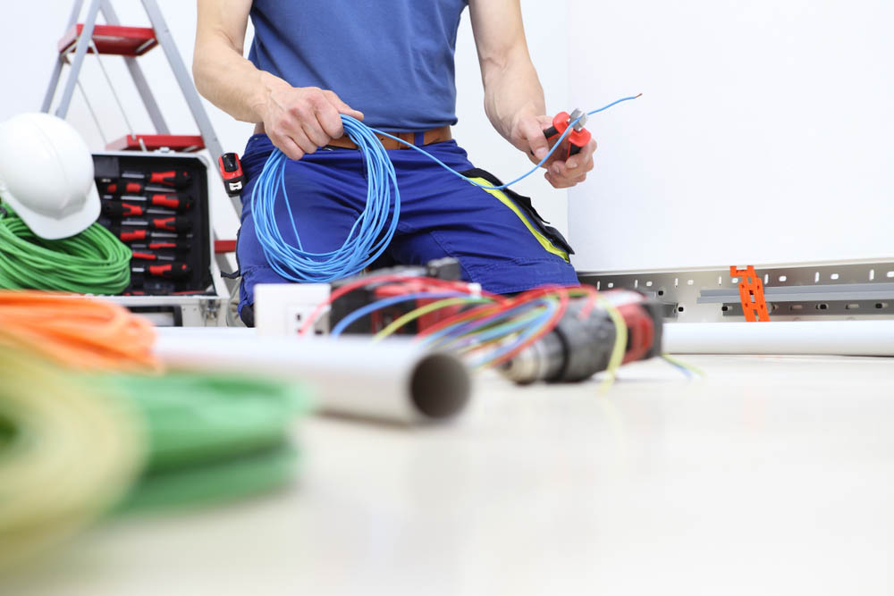 electrician at work circuit rewiring Cocoa Beach, FL